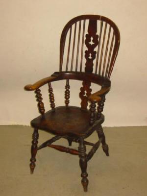 Appraisal: AN ASH AND ELM BROAD ARM WINDSOR CHAIR similar to