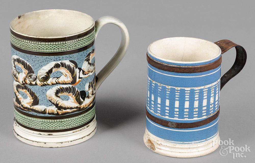 Appraisal: Two mocha mugs th c Two mocha mugs th c