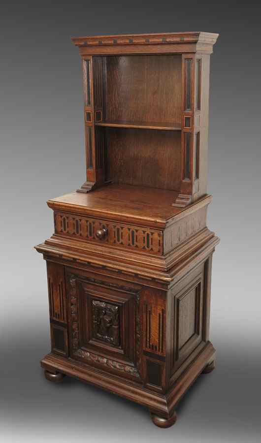 Appraisal: CONTINENTAL CARVED OAK SIDE BOOKCASE CABINET In sections top section