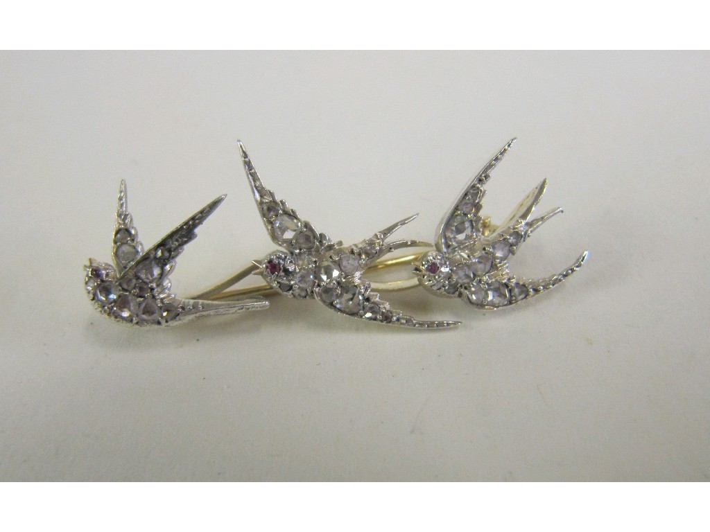 Appraisal: Victorian diamond set flight of swallows bar brooch