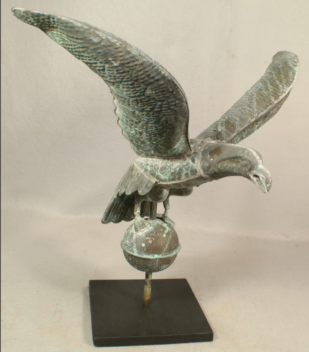 Appraisal: Full body copper eagle weathervane on wood platform base wingspan