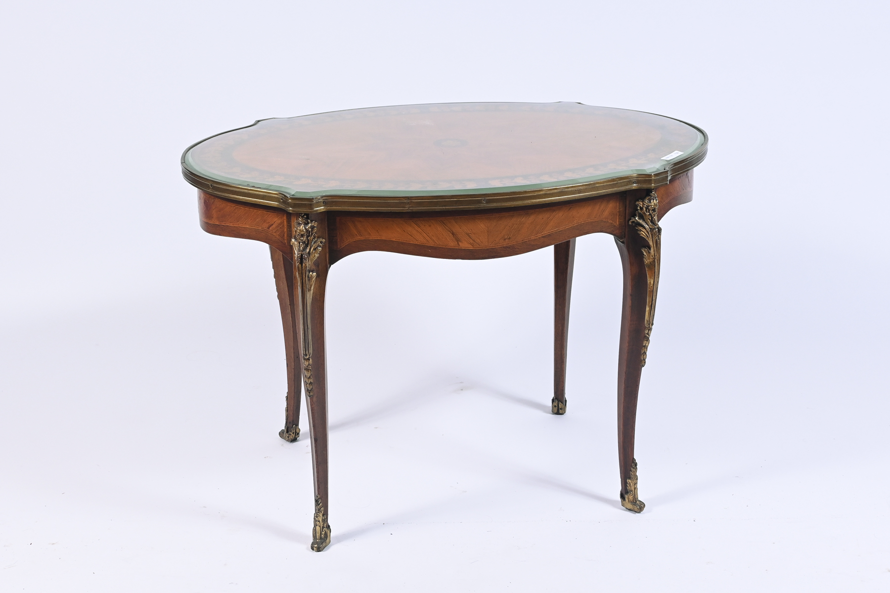 Appraisal: ORMOLU MOUNTED MARQUETRY COFFEE TABLE Beveled glass top protecting a