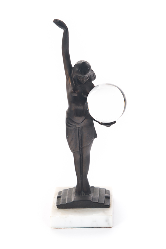 Appraisal: EGYPTIAN-STYLE BRONZE OF A FEMALE FIGURE HOLDING A CRYSTAL BALL