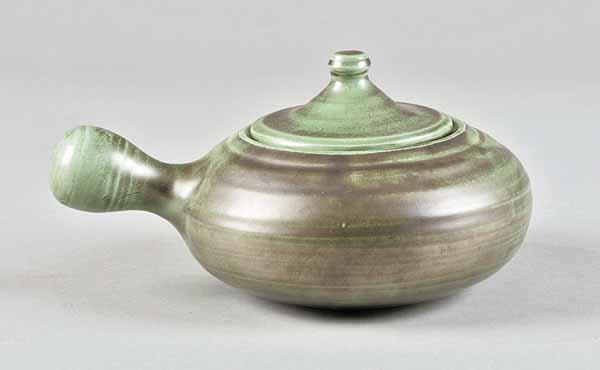 Appraisal: A Shearwater Art Pottery Green Glaze Bean Pot with Cover