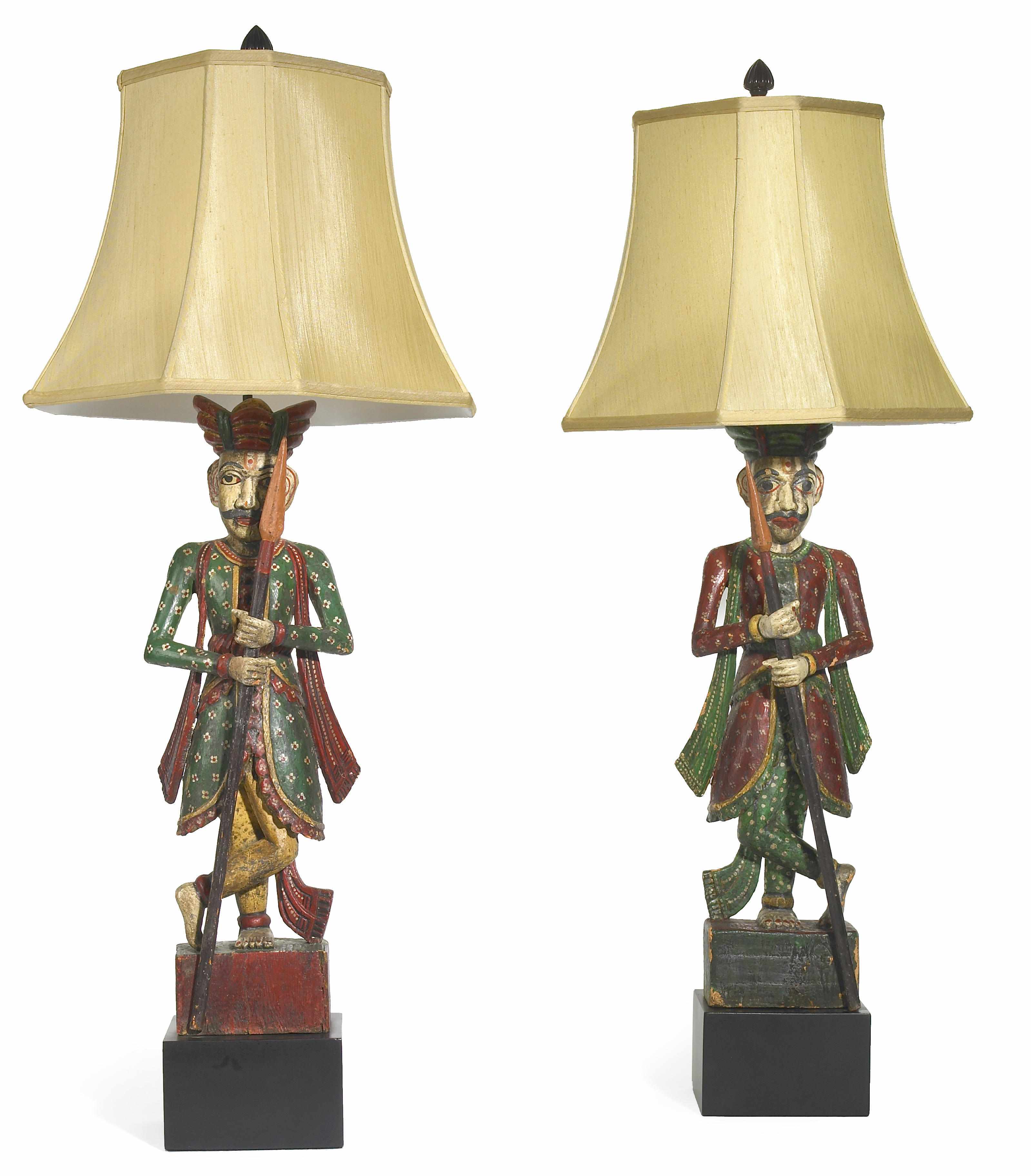 Appraisal: A pair of Tony Duquette Studios carved polychromed wood figural