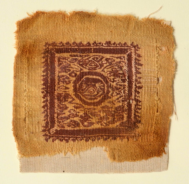 Appraisal: A SQUARE TAPESTRY PANEL labelled 'The Eye probably Fifth century'