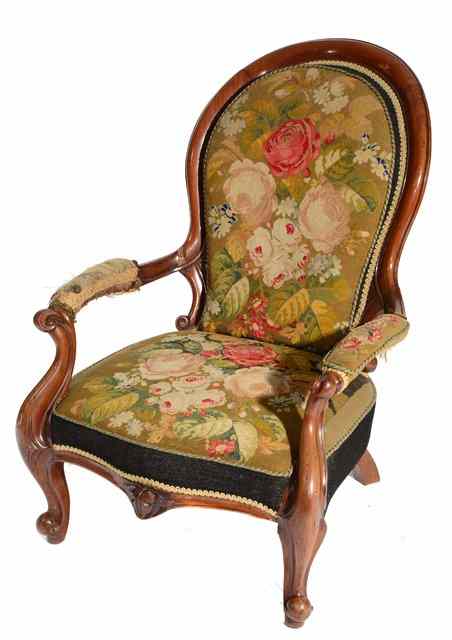 Appraisal: A VICTORIAN MAHOGANY ARMCHAIR with serpentine front and cabriole legs