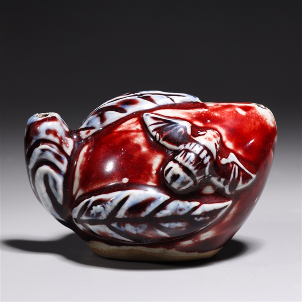 Appraisal: Korean red blue and white glazed ceramic peach form water