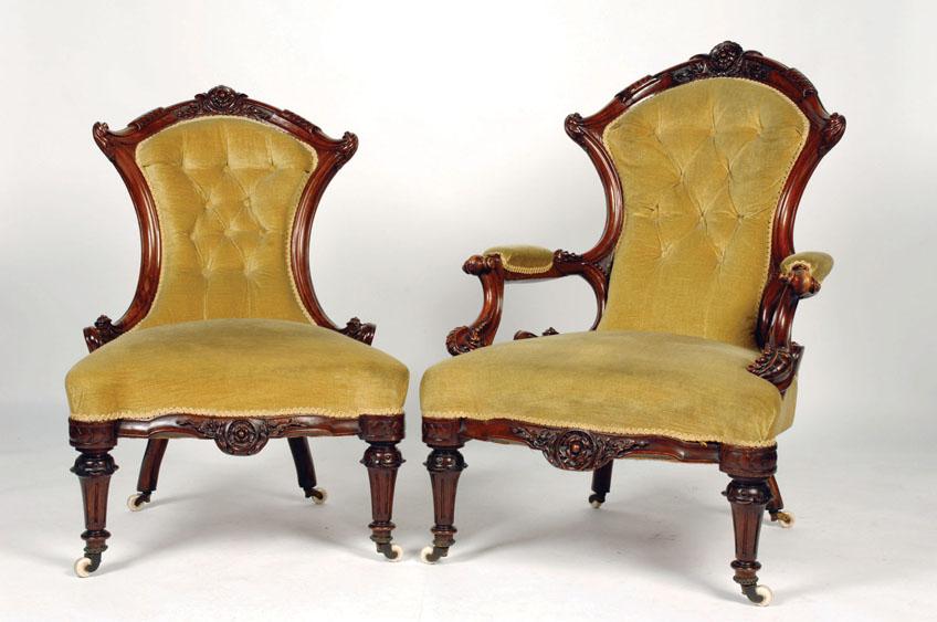 Appraisal: AN EARLY VICTORIAN WALNUT FRAMED GENTLEMAN'S ARMCHAIR with a scroll