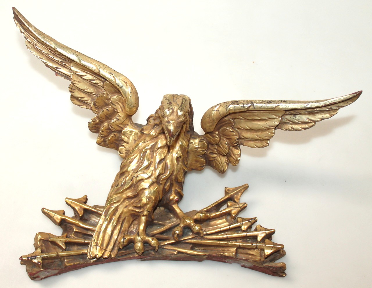 Appraisal: A plaster gilt and gilt wood figure of an eagle