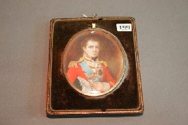 Appraisal: A portrait miniature of an officer in a red uniform