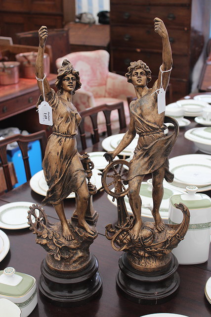 Appraisal: A PAIR OF GOLD PAINTED SPELTER FIGURES each on a