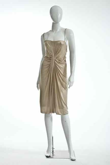 Appraisal: CHRISTIAN DIOR COCKTAIL DRESS Size Pale gold ruched waist creating