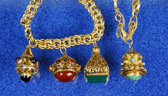 Appraisal: TWO YELLOW GOLD AND GEM SET CHARM BRACELETS one with