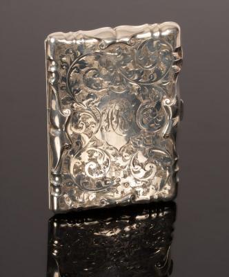 Appraisal: A silver aide-m moire VIB Ltd Birmingham engraved with flowers