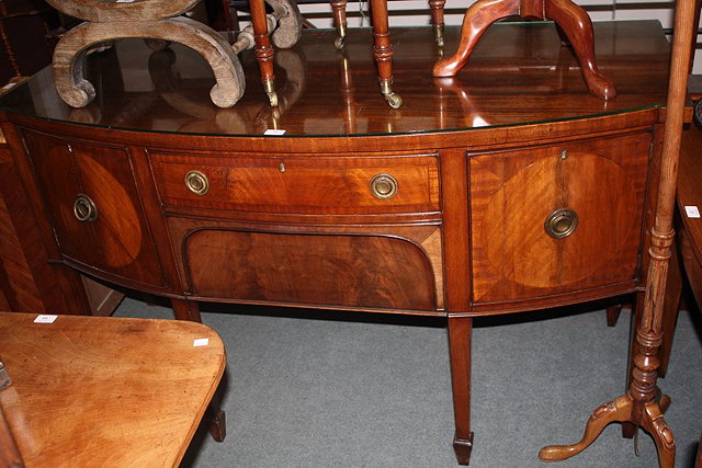 Appraisal: A GEORGIAN STYLE MAHOGANY BOW FRONT LARGE SIDEBOARD with two