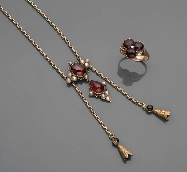 Appraisal: A Victorian garnet seed pearl and gold necklace with a