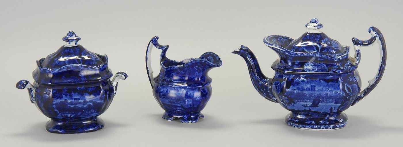 Appraisal: THREE-PIECE STAFFORDSHIRE TEA SETEnglish th CenturyIn dark blue Wadsworth Tower''