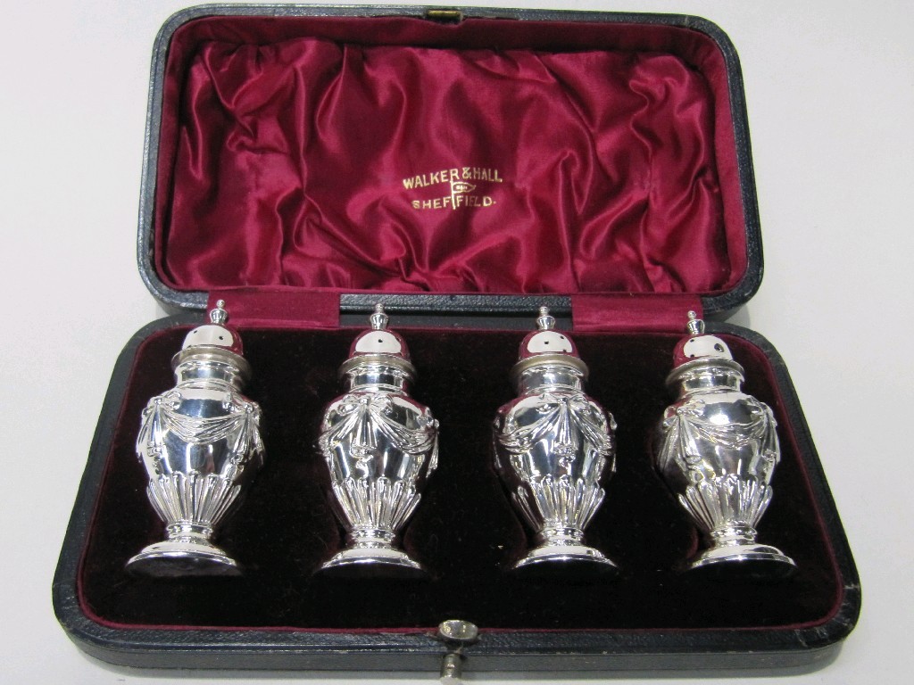 Appraisal: Cased set of four silver pepperettes Sheffield