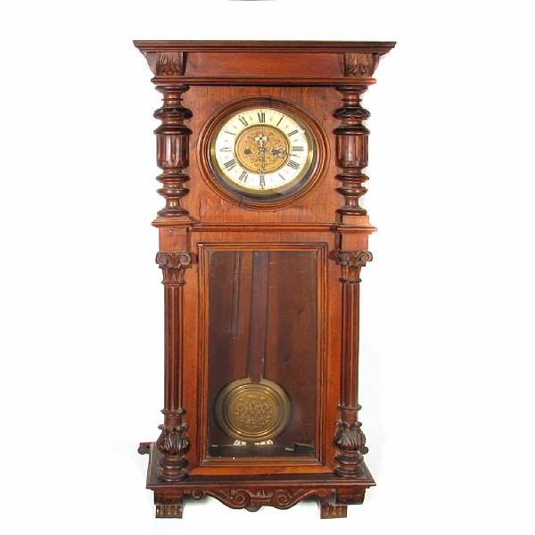 Appraisal: A Renaissance style carved walnut wall clock losses height in