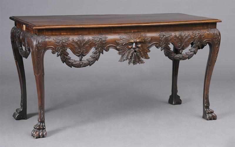 Appraisal: IRISH GEORGE II STYLE CARVED MAHOGANY CONSOLE TABLE The rectangular