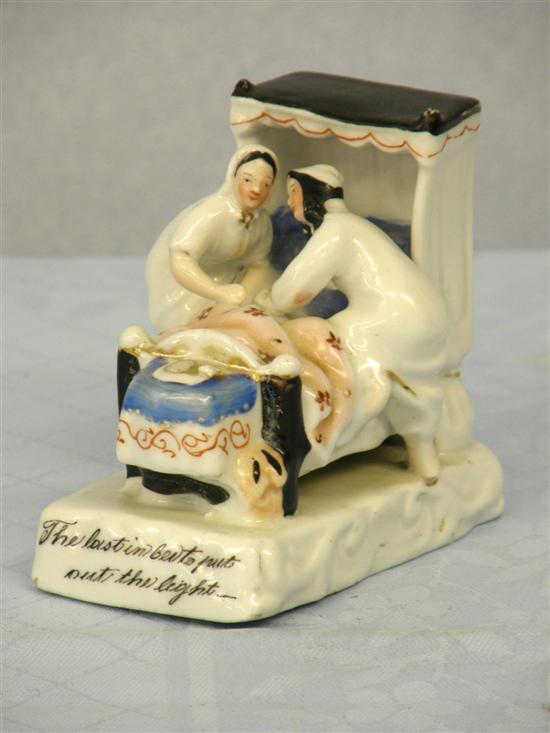 Appraisal: German porcelain fairing 'The last in bed puts out the