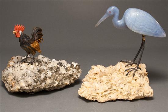 Appraisal: Continental carved hardstone stork on quartz base and a similar