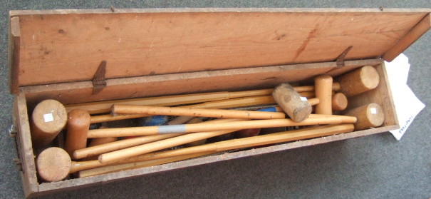 Appraisal: A croquet set including four mallets balls hoops and some