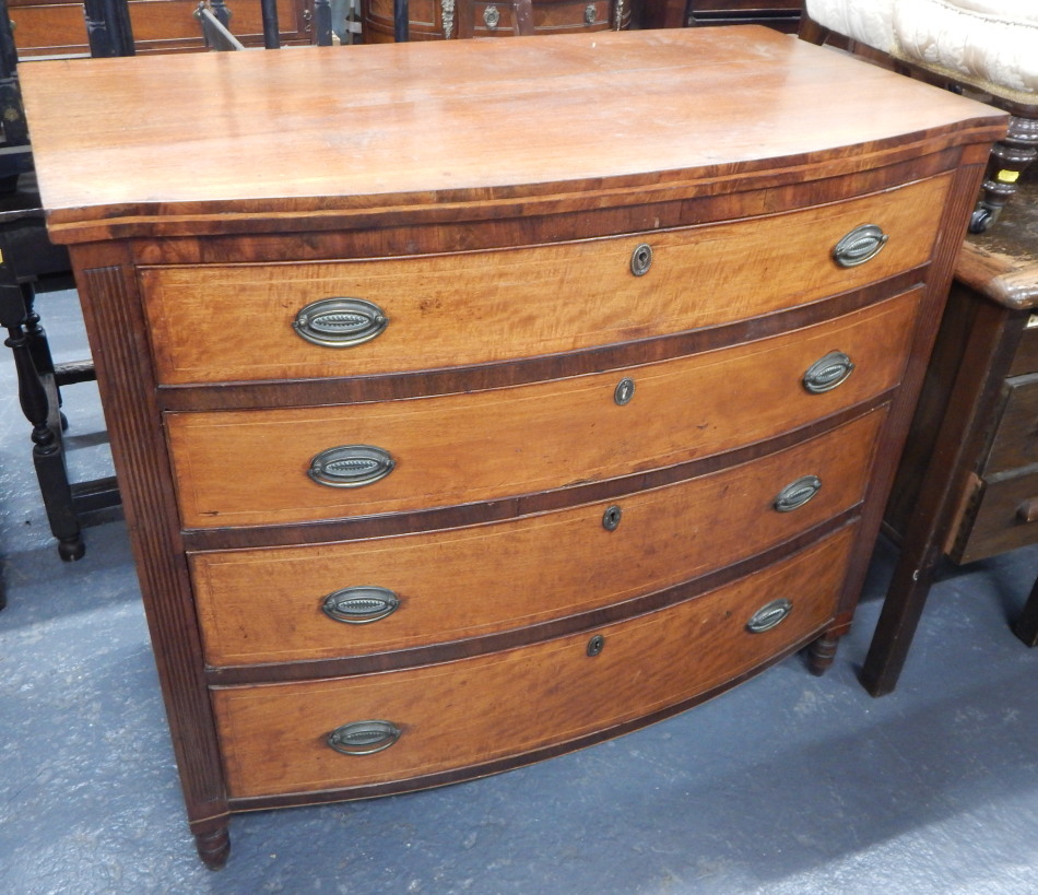 Appraisal: An early thC mahogany bow fronted chest of drawers with