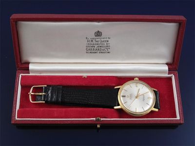 Appraisal: An ct gold wristwatch Omega automatic Seamaster Deville Associated band