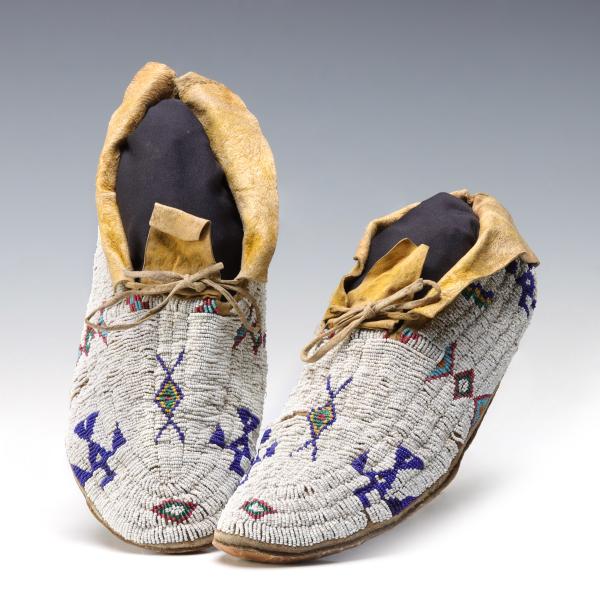 Appraisal: GOOD SIOUX OR CHEYENNE BEADED MOCCASINS CIRCA The heavily beaded