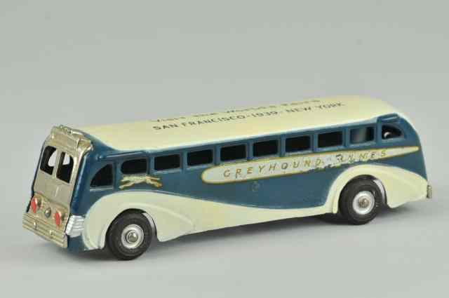 Appraisal: GREYHOUND BUS WITH WORLD'S FAIR Arcade cast iron painted in