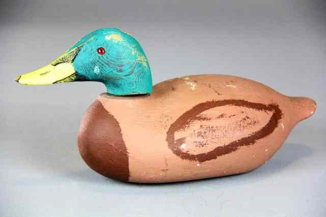 Appraisal: Attributed Mason Factory Premier Duck DecoyDepicting a hand painted brown