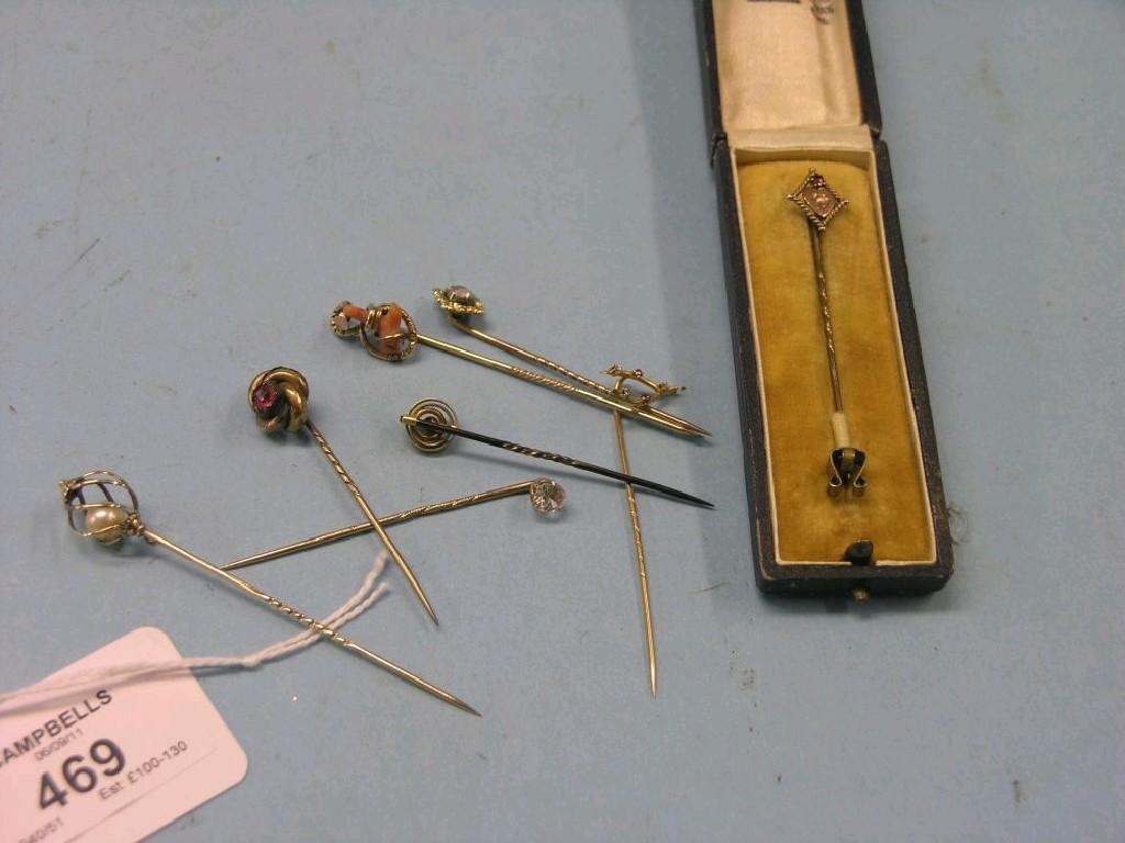 Appraisal: Eight various Victorian Edwardian stick pins one cased