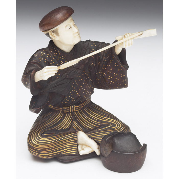 Appraisal: Japanese sculpture Meiji period seated figure with arrow lacquered wood