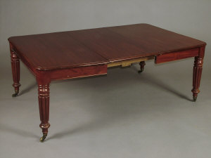 Appraisal: A Victorian mahogany extendable dining table the moulded top above