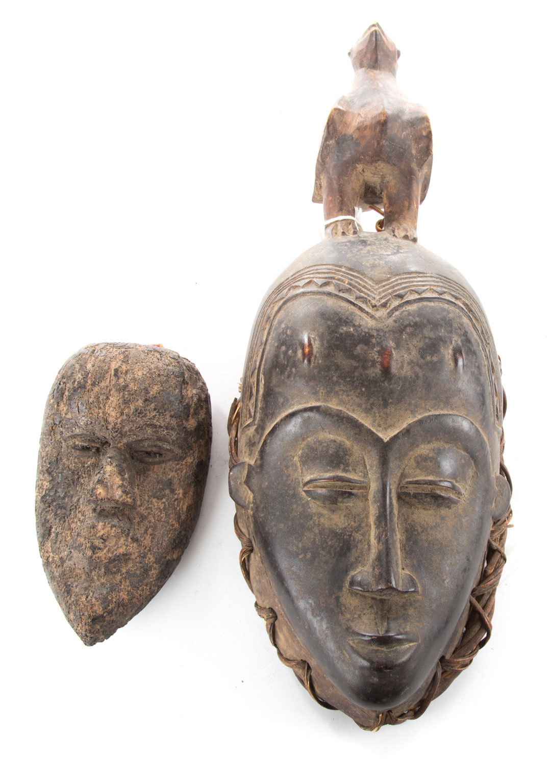 Appraisal: Khran Tribe mask and Ivory Coast mask Khran Tribe mask