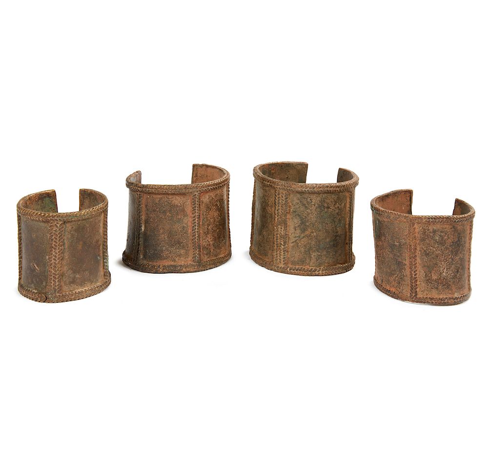 Appraisal: Set of Four African Cuffs or Currency Set of four