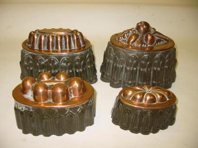 Appraisal: A VICTORIAN TIN AND COPPER JELLY MOULD of oval tapering