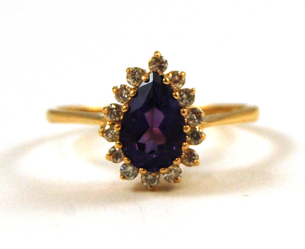 Appraisal: AMETHYST DIAMOND AND FOURTEEN KARAT GOLD RING with round-cut diamonds