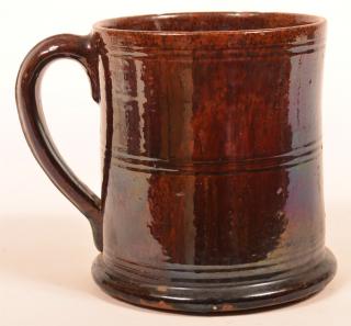 Appraisal: PA Mottle Glazed Redware Large Mug Pennsylvania th Century Mottle