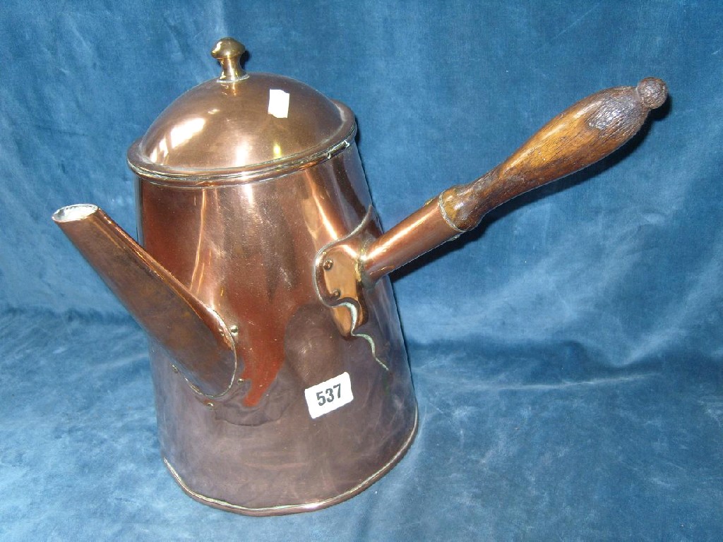 Appraisal: A large copper chocolate type pot with turned wooden handle