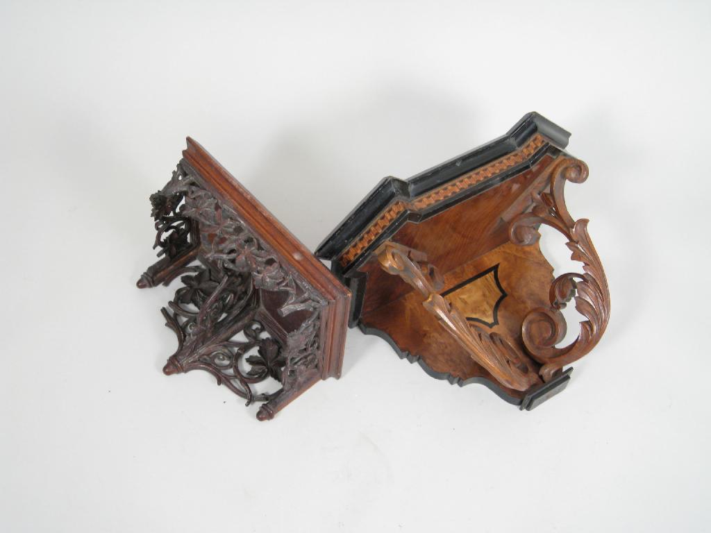 Appraisal: A decorative walnut Clock Bracket ebonised inlay