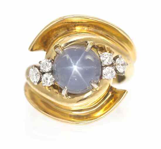 Appraisal: A Retro Karat Yellow Gold Star Sapphire and Diamond Ring