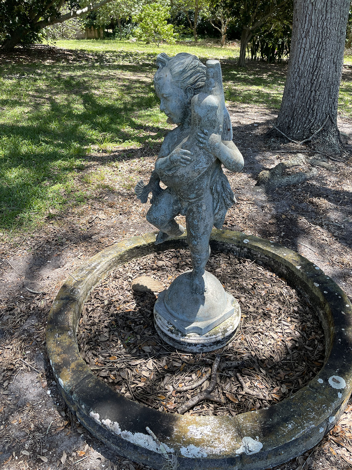 Appraisal: BOY WITH FISH BRONZE GARDEN FOUNTAIN Well patinated bronze Fountain