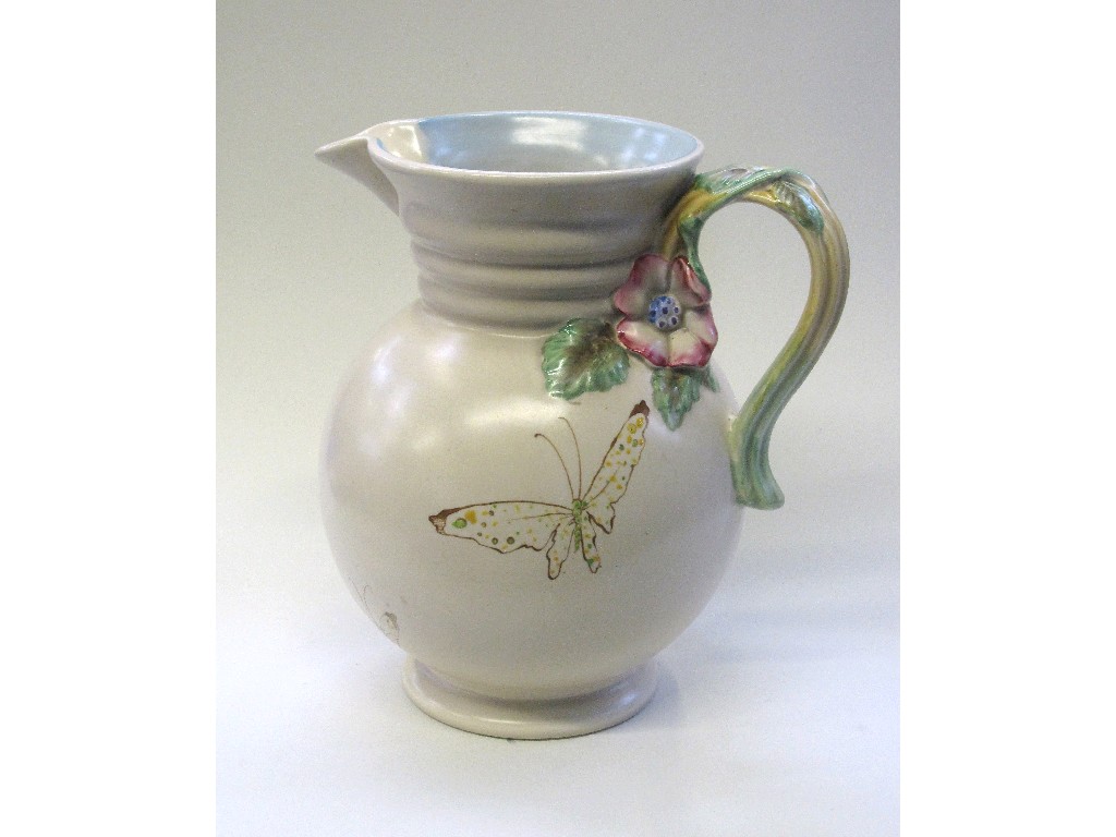 Appraisal: Clarice Cliff jug decorated with butterflies and a moulded floral