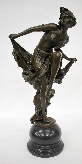 Appraisal: A CONTEMPORARY BRONZE SCULPTURE of a dancing girl with a