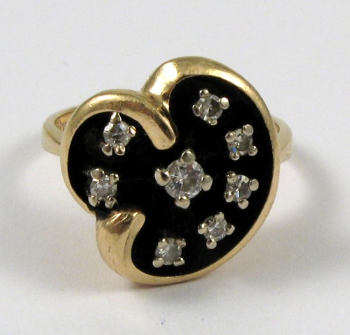 Appraisal: DIAMOND AND FOURTEEN KARAT GOLD RING set with eight round-cut