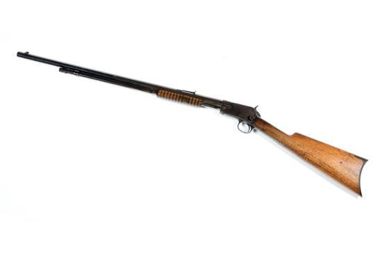 Appraisal: WINCHESTER MODEL PUMP RIFLE American caliber with a octagon barrel