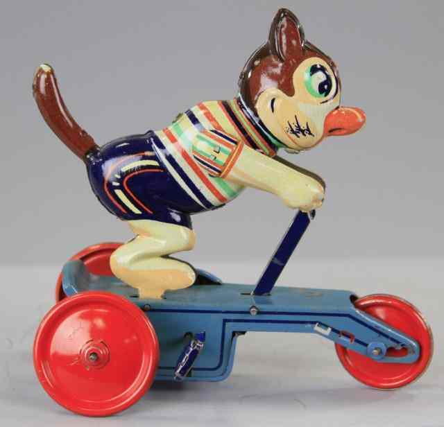 Appraisal: CAT RIDING SCOOTER Lithographed tin colorful toy depicts three wheel